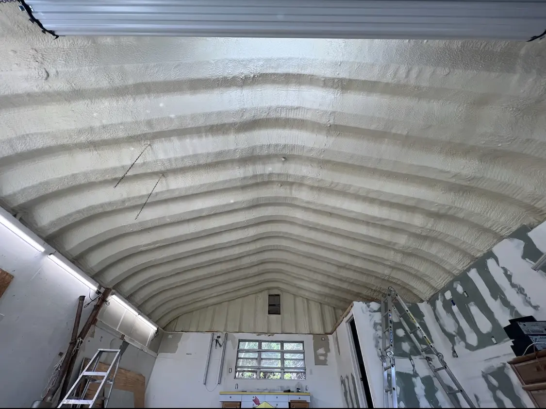 Spray polyurethane foam applied to the underside of a metal roof deck in Ellensburg